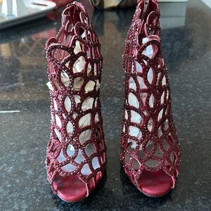 Sergio Rossi Red Stiletto Heels with Intricate Cut-Out Design